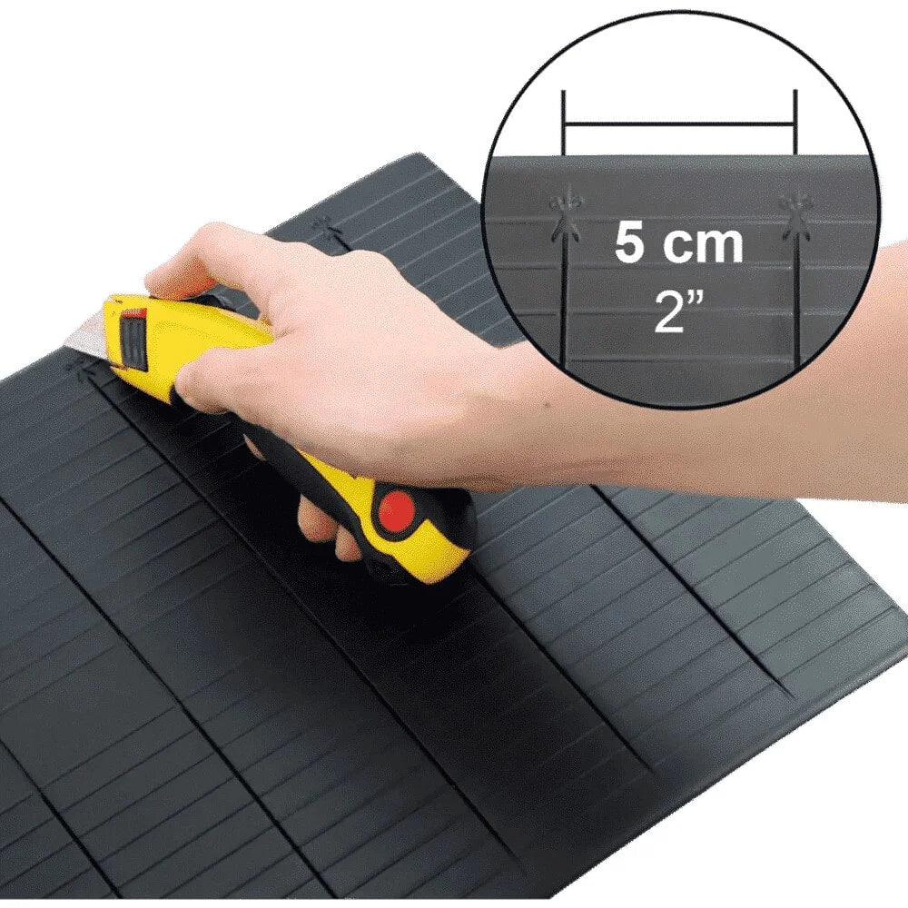 Ramp och tröskel a hand holding a yellow cutter