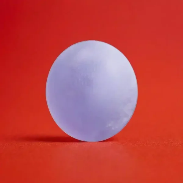 a purple ball on a red background