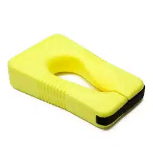 a yellow object with a hole in the middle