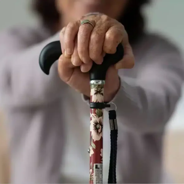 a woman holding a cane