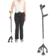 a woman standing next to a crutch