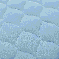 Incontinence cover for bed washable in blue color, close-up of quilted surface