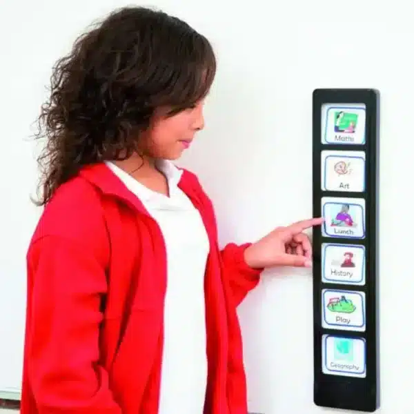 a girl pointing at a touch screen