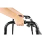 a hand holding a handlebar