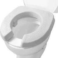 Gray soft toilet seat placed on a toilet seat.