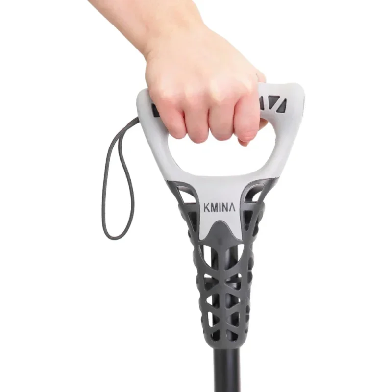 Handtag med bekväm greppyta och stödrem Ergonomiskt handtag med handledsrem för trygg användning