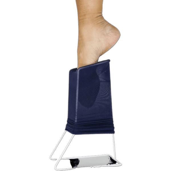 Sock puller in profile, foot on its way down in the setting, clearly illustrating how to put on without bending the back.