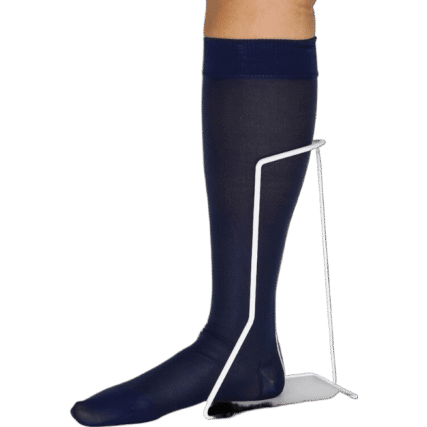 Close-up of a steel foot stand with a sock where the stand stands stable on the floor and the foot is inserted into the sock