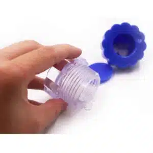 a hand holding a plastic container