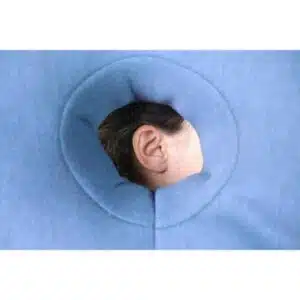 a person's ear in a hole