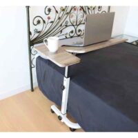 a laptop on a bed