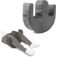 Reversible pillow. a black pillow with a black object on it