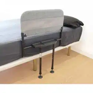 a bed with a chair and a seat
