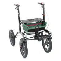 Rollator Walker 14er Trionic. Rollator for outdoor use with large air-filled wheels and green storage bag, shown obliquely from the front.