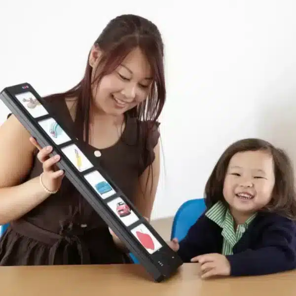 a woman and a child looking at a board