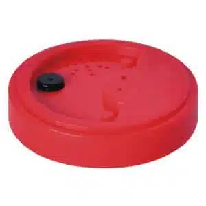 a red plastic lid with a black button