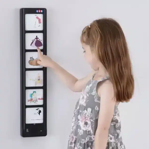 a girl touching a screen