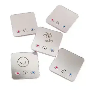 a group of square white objects with a drawing on them