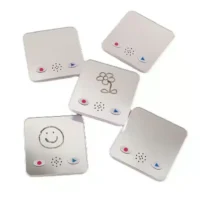 a group of square white objects with a drawing on them
