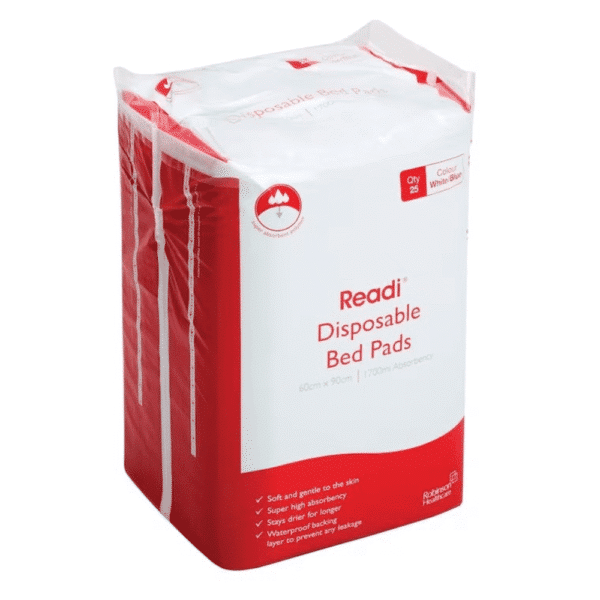 a red and white disposable bed pads