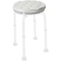 Round shower stool cushion with drainage and non-slip surface mounted on shower stool
