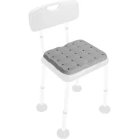 Shower stool cushion with drainage and non-slip surface mounted on white shower chair