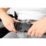 Hyra rullstol över helg a person's hands holding a black buckle