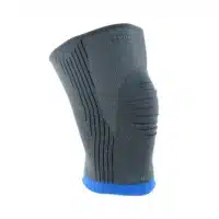 GenuAction Knee Brace size 5 – elastic anatomical knee brace with blue edge, shown in studio environment.