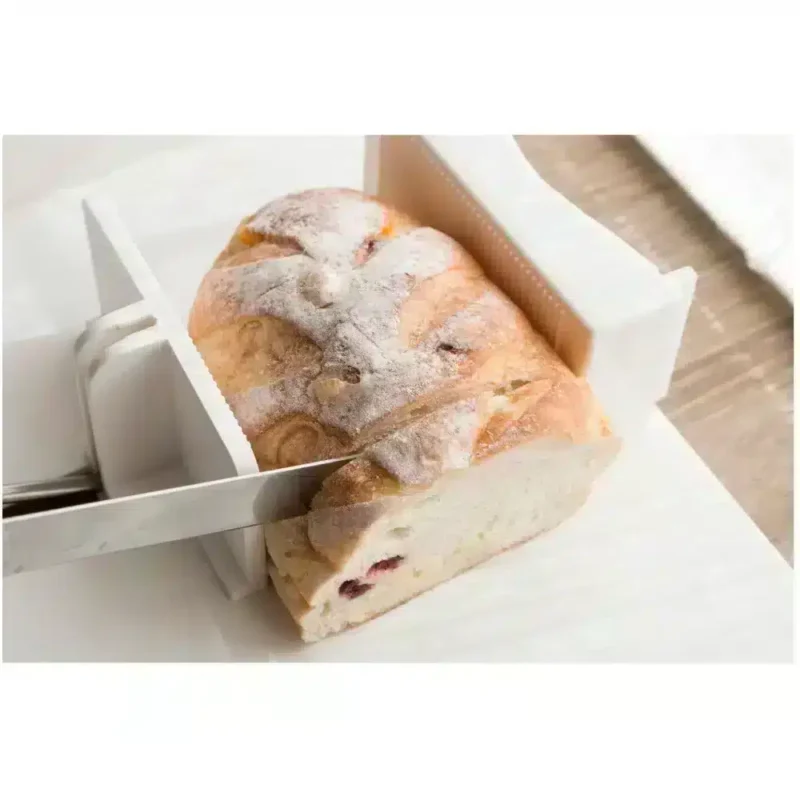 L-format hörn för fixering Skärbrädans hörn håller brödskiva vid bredning