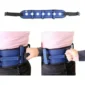 Transferbälte med 7 handtag i blå och svart färg, visat runt midjan på användare