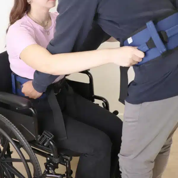 Transfer from wheelchair using transfer belt with handle