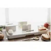Multifunctional cutting board placed on kitchen counter