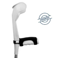 Hand protection for crutch handle. Hand protection mounted on white crutch with certification symbol