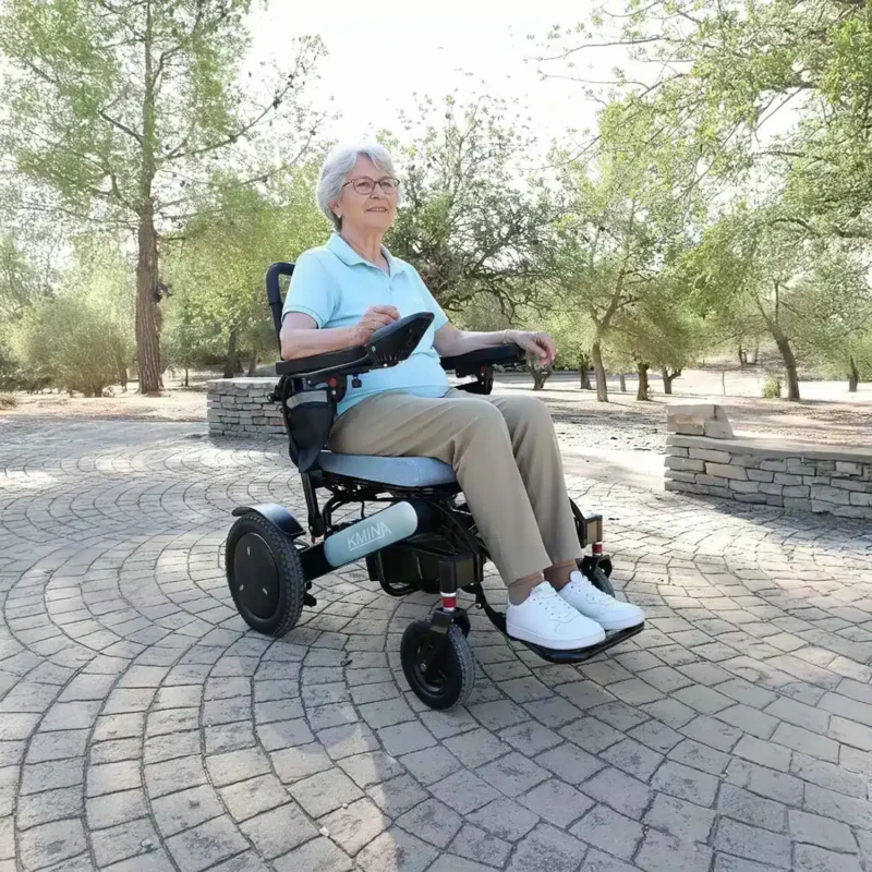 Blå elektrisk rullstol utomhus Blå elektrisk rullstol utomhus användning